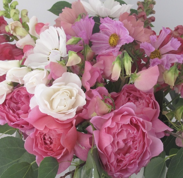 Rose bouquet with sweet peas and greenery